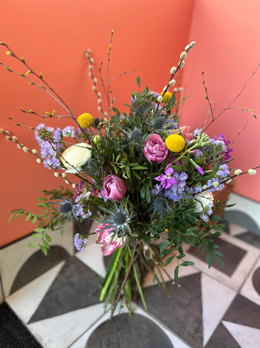 Spring tulip and thistle bouquet