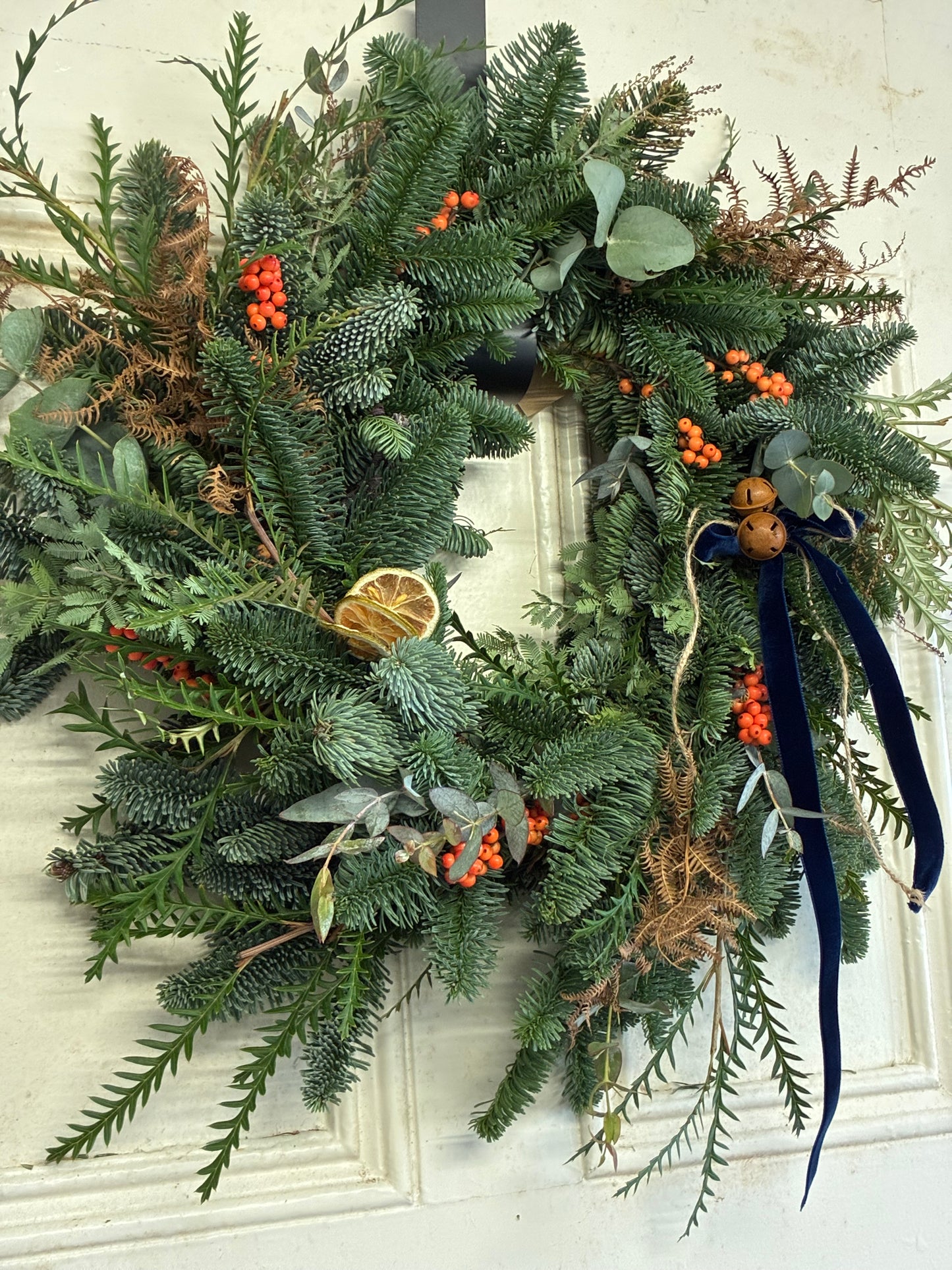 Red and green festive wreath