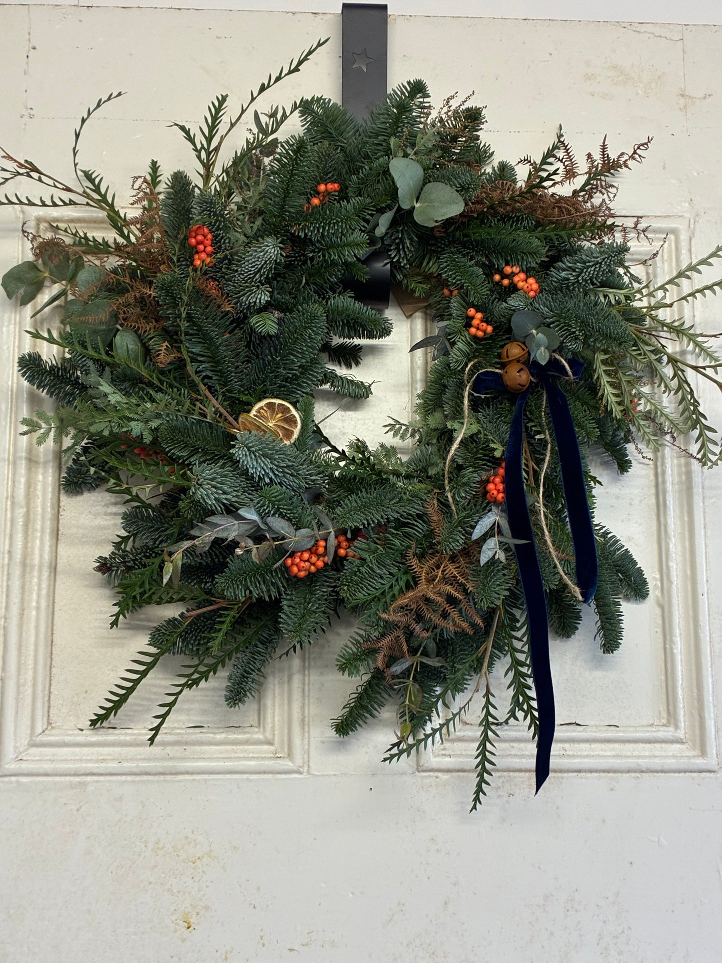 Red and green festive wreath